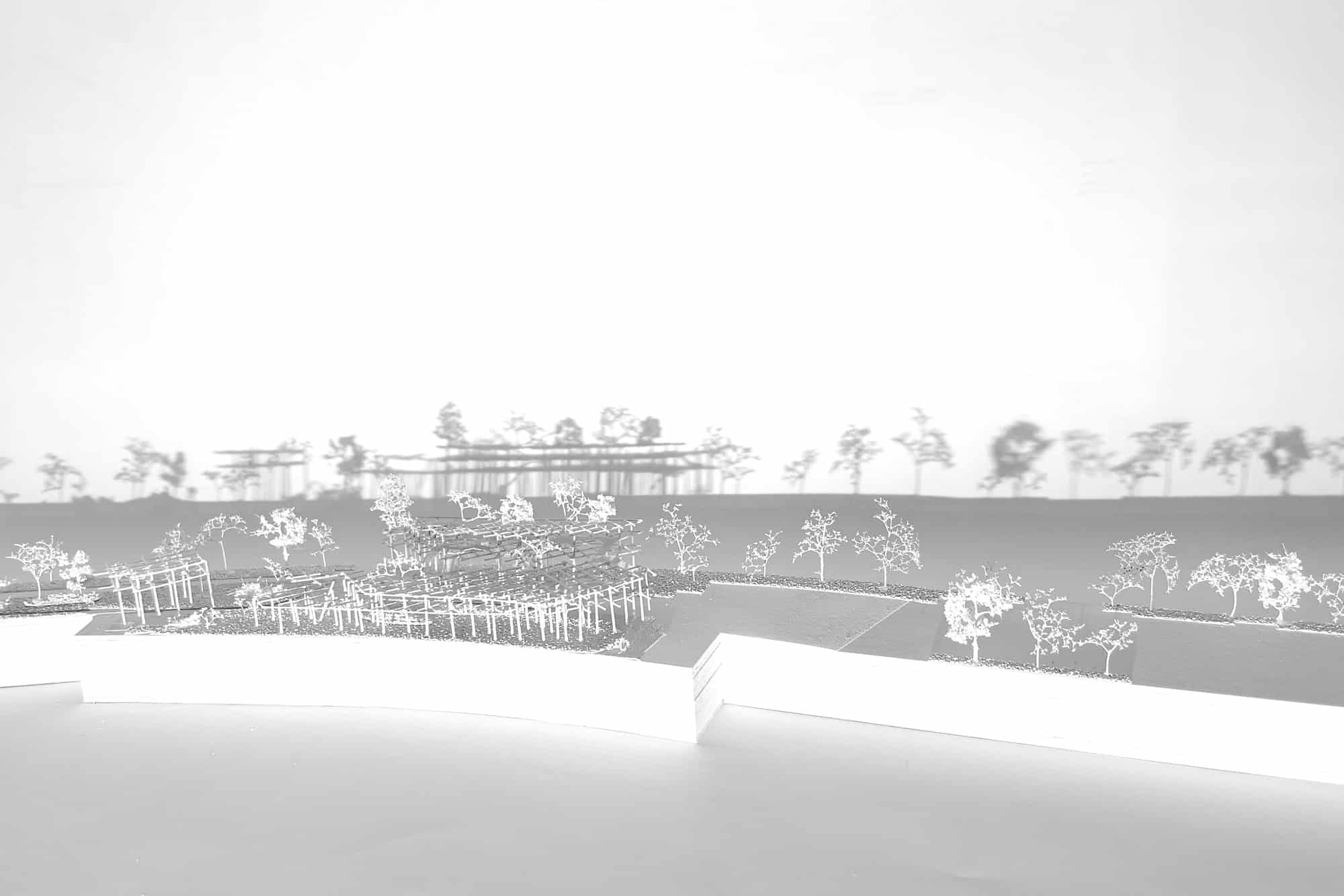 White model at eye level: frames and model trees of the Raumpark along the curved edge of the site asphalt kollektiv