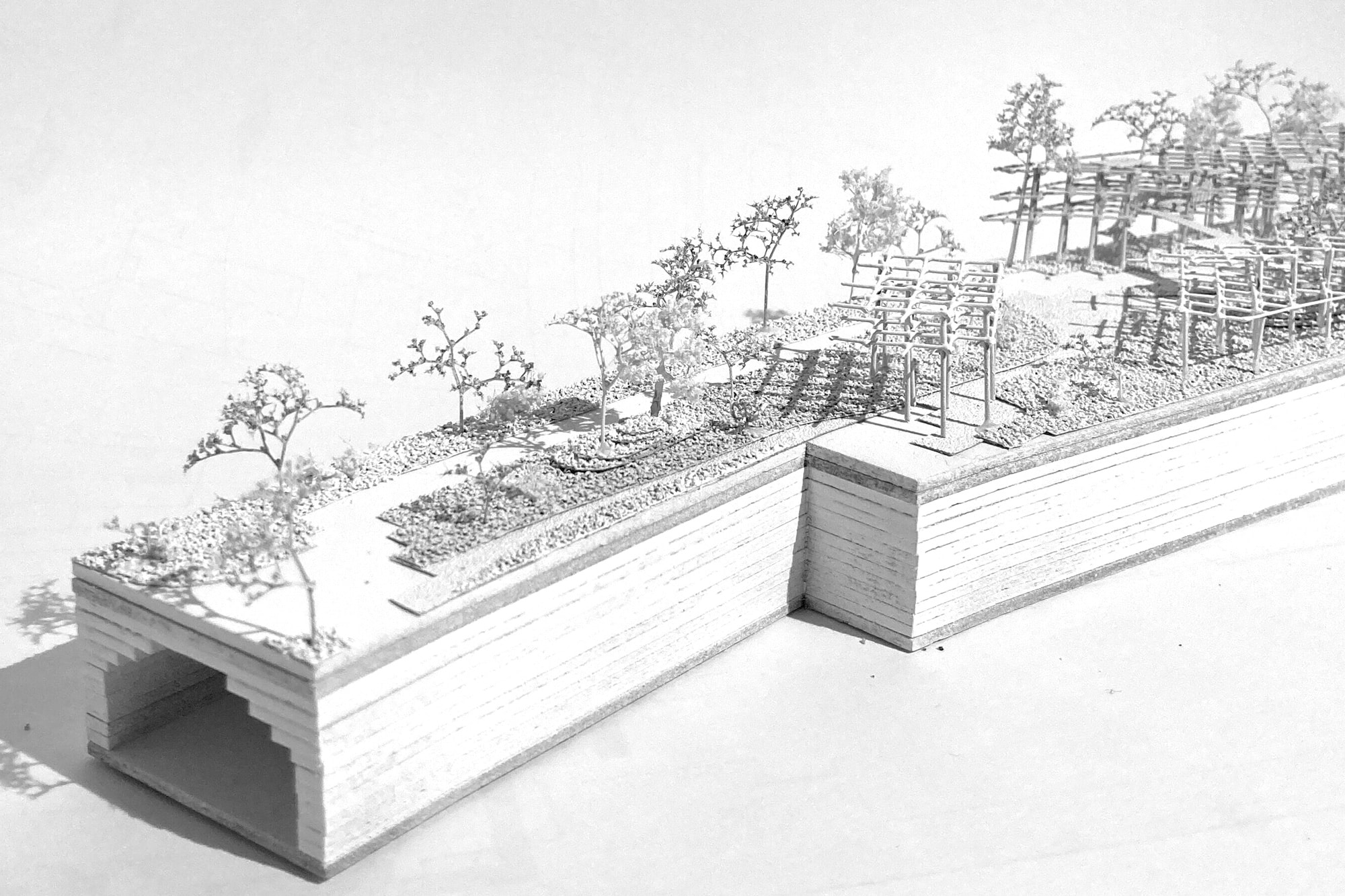 Model showing the layered ground above the Wien river vault, with planting and frames on top asphalt kollektiv